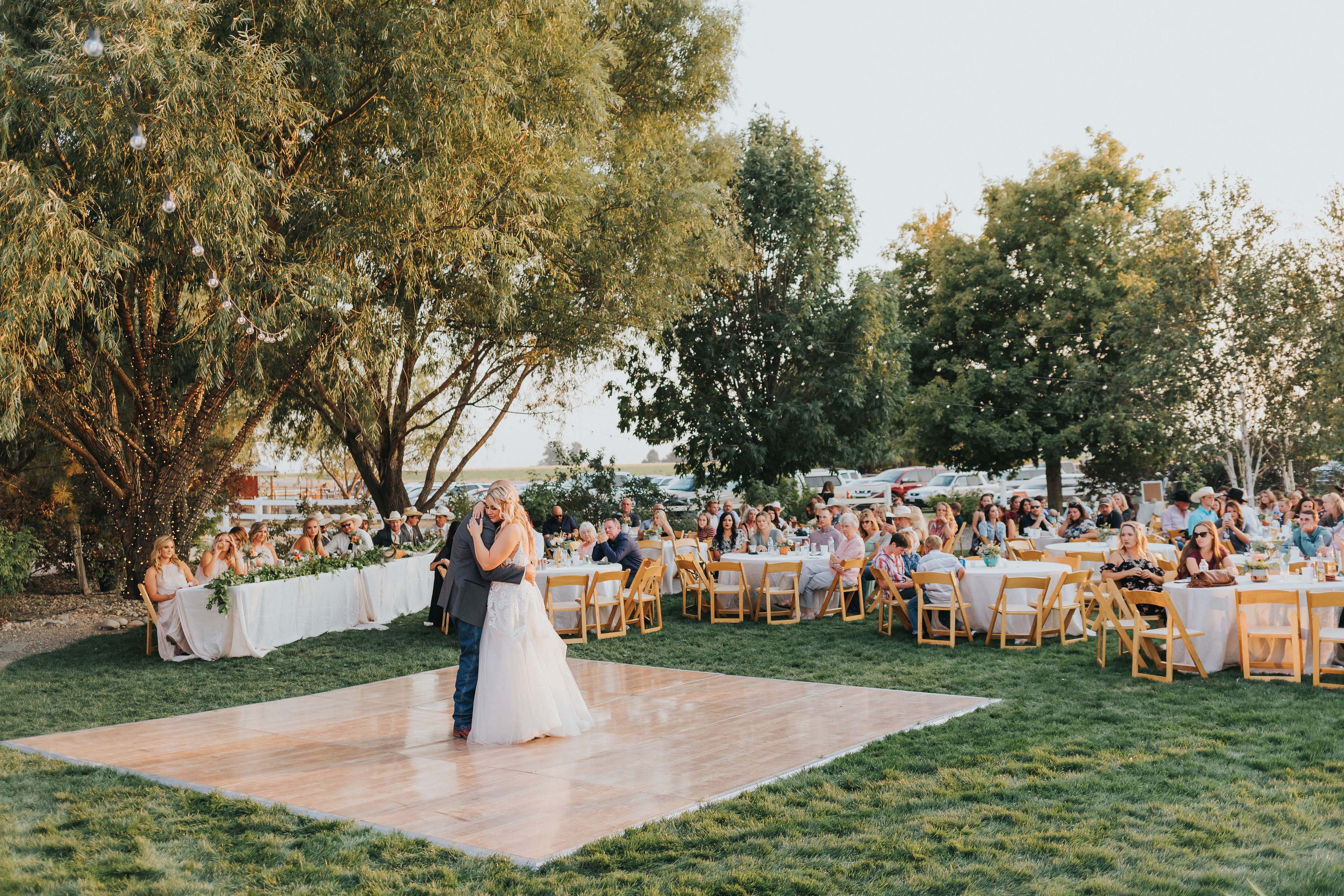father, daughter dance in scenic Nampa, Idaho outdoor wedding venue